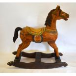 A 20th Century Polychrome Carved Rocking Horse,