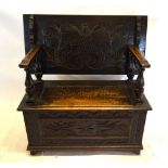 A Victorian Carved Oak Monks' Bench,