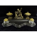 A 19th Century French Black Slate and Ormolu Mounted Desk Stand of serpentine form with a central