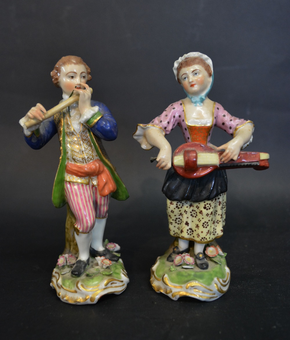 A Pair of 19th Century Derby Figures in the form of Musicians,