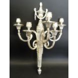 A Silver Plated Five Branch Wall Sconce decorated with bows and swags with scroll arms,