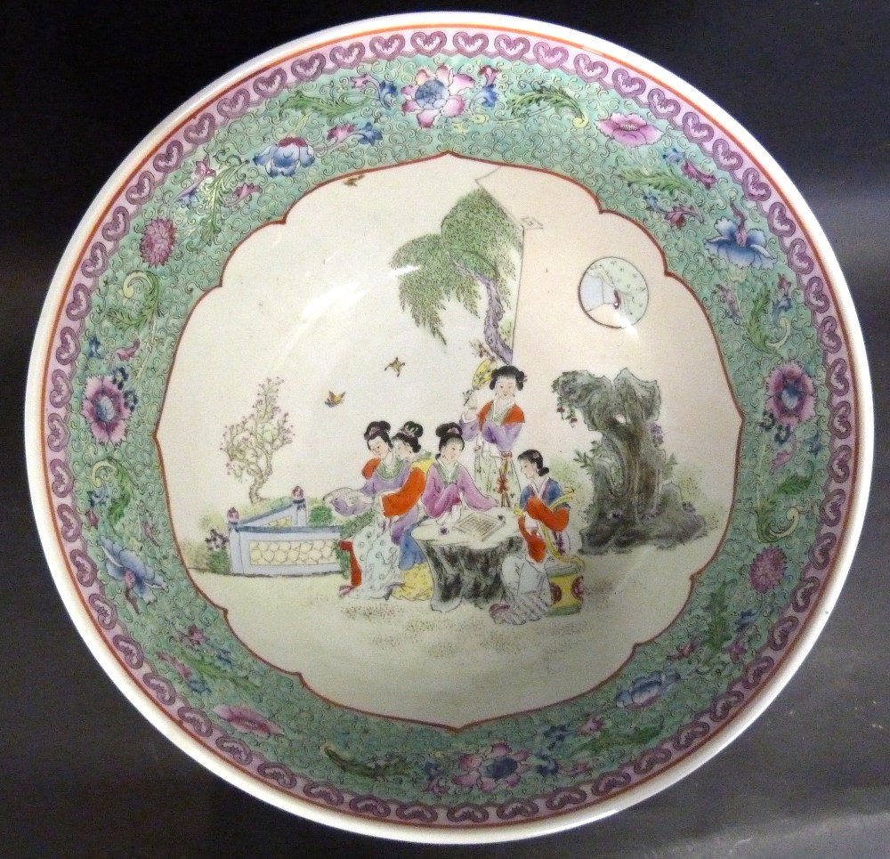 A 19th Century Chinese Large Famille Rose Bowl decorated in coloured enamels with reserves - Image 2 of 4