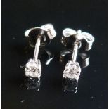 A Pair of 18ct. White Gold Diamond Ear S