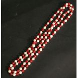 A Pearl and Garnet Bead Long Necklace