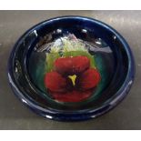 A Moorcroft Tube Lined Pansy Pattern Bow