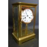 A 19th Century French Brass Cased Four Glass Library Clock,