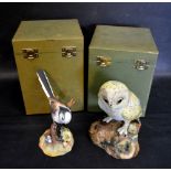 A Royal Crown Derby Model in the form of a Long Tailed Tit with original box together with a Royal