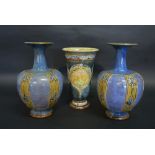 A Pair of Royal Doulton Stone Ware Baluster Form Vases together with another similar Doulton flared