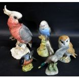 A Beswick Model of a Cockatoo No. 1180 together with another similar model of a Budgerigar No.