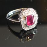 An 18ct. White Gold Ruby and Diamond Rin