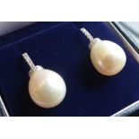 A Pair of 18ct. White Gold Pearl and Dia