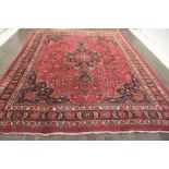 A North West Persian Woollen Carpet, wit