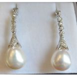 A Pair of 18ct. White Gold Pearl and Dia