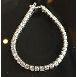 A 14ct. White Gold Diamond Line Bracelet