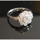 An 18ct. White Gold Diamond Cluster Ring