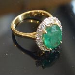 An 18ct. Yellow Gold Emerald and Diamond