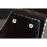 A Pair of White Gold Diamond Earstuds, a