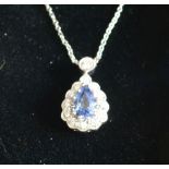 An 18ct. White Gold Sapphire and Diamond