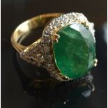 An 18ct. Yellow Gold Emerald and Diamond