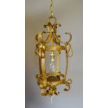 A Wrought Iron Gilded Hall Lantern of Scroll Work Form,