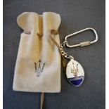 An Early Maserati Keyring with Pouch