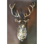 A Silvered Model in the form of a Stag's Head with six pointed antlers,