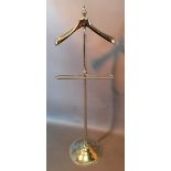 A Valet Stand with circular base,