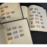 A Group of Four Stamp Albums Containing Foreign Stamps