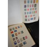 A Group of Four Stamp Albums Containing Foreign Stamps