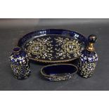 A 19th Century Blue Glass and Coloured Enamel Dressing Table Set comprising of oval tray,