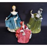 A Royal Doulton Figurine 'Janine' HN2461 together with two other Royal Doulton figurines 'Linda'