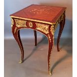 A French Marquetry Inlaid and Gilt Metal