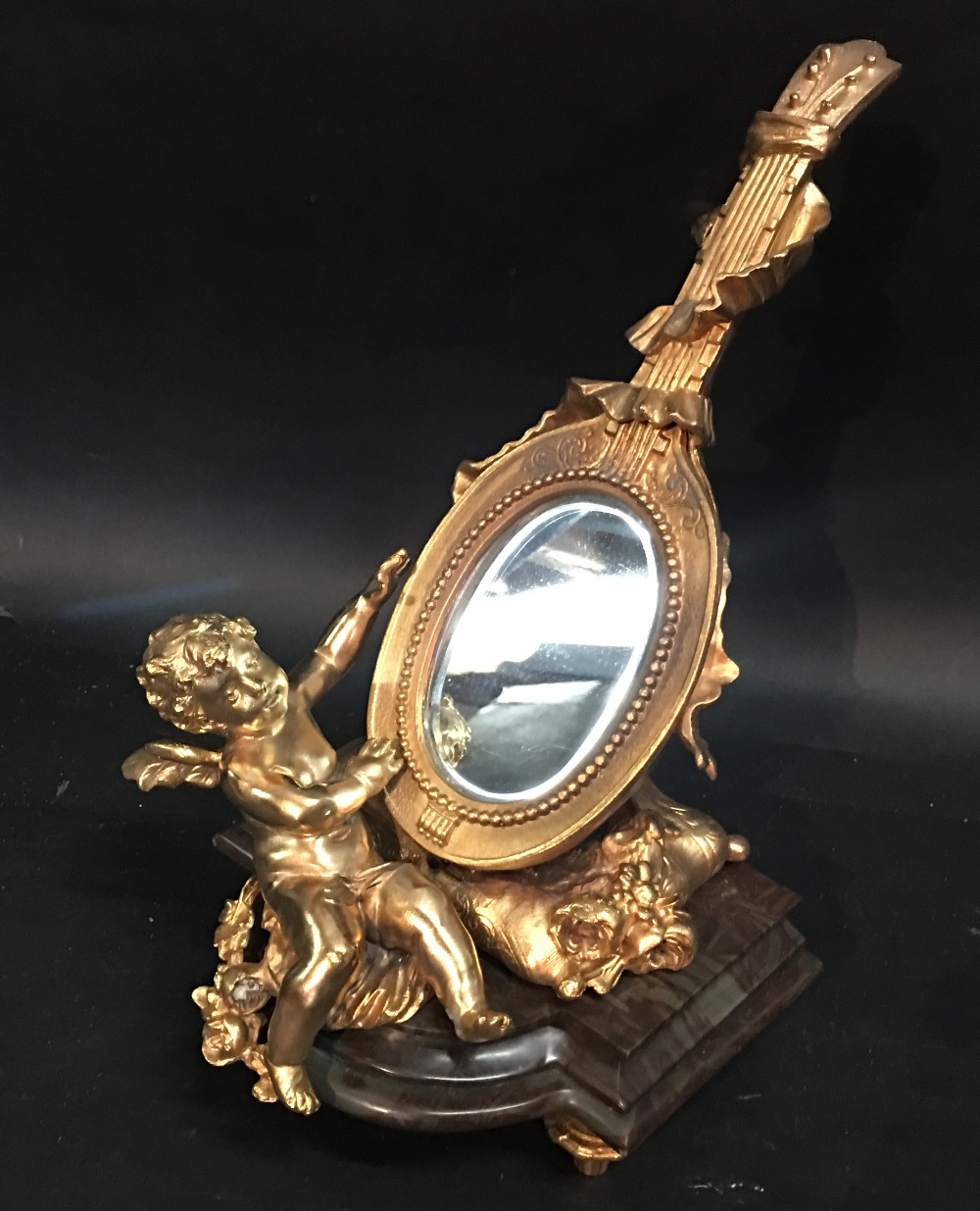 A French Ormolu Table Mirror in the form