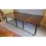 A Regency Mahogany Extending Dining Tabl