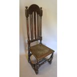 An 18th Century Oak Hall Chair with an a