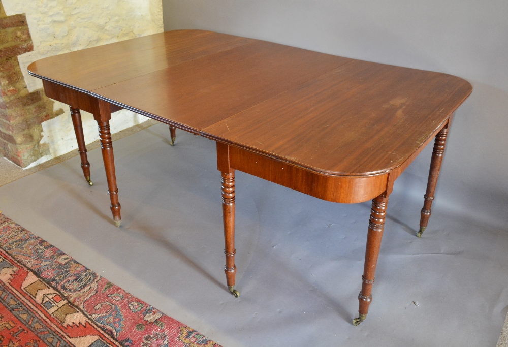 A Regency Mahogany Dining Table, the ree