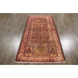 A North West Persian Woollen Rug with an