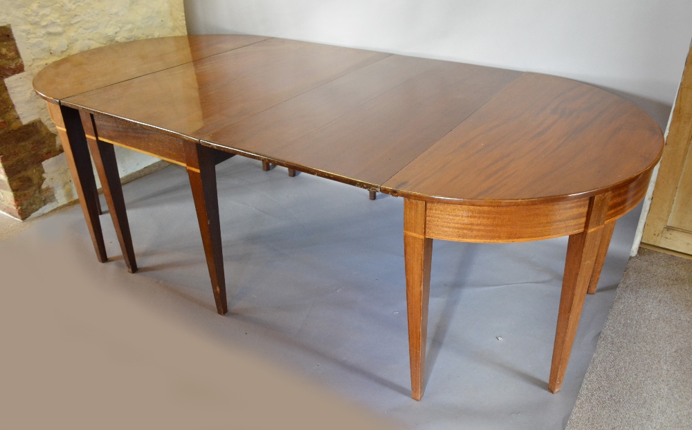 A George III Mahogany Extending Dining T