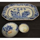 An 18th Century Chinese Underglazed Blue Decorated Dish together with a similar teacup and saucer