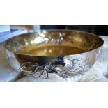 An 800 Mark Silver Bowl decorated in relief with vining fruit and with silver gilt interior,
