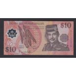 Brunei - 1996  10 Ringitt, P27, Grade GEF.  Poly plastic note.