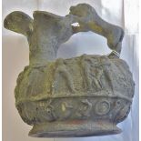 A Victorian, Basalt wing-jug with a rampart lion handle above a mask of Bacchus, a moulded frieze