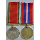 South African WWII War Medal and Defence Medal to a Woman: W548126 E. Tomlinson. Unusual