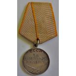 Russian WWII Battle Merit Medal this military medal awarded for "combat action resulting in a