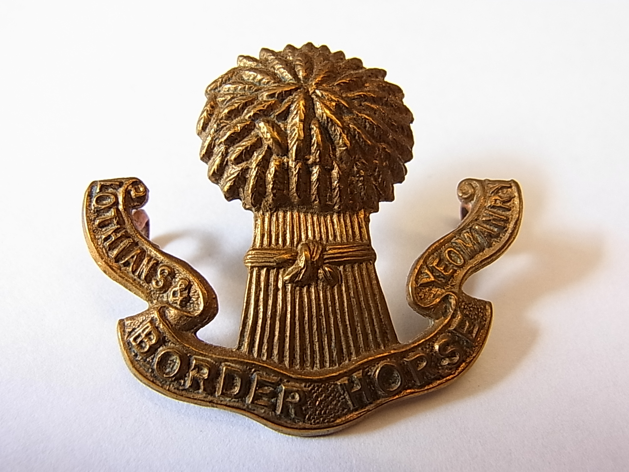 The Lothian and Border Horse Yeomanry OR's cap badge (Brass, Lugs) K&K 1466