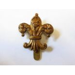 The Manchester Regiment 7th (Ardwick) Territorial Battalion cap badge (Brass, slider) K&K: 1746