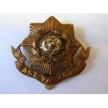 The East Yorkshire Regiment cap badge (Bi-metal, slider) Maker J.R. Gaunt. K&K: 609