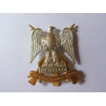 Royal Scots Dragoon Guards cap badge (Staybright, slider) maker marked 'London Badge & Button Co,