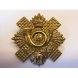 The Highland Light Infantry cap badge, KC (White-Metal, Lugs) K&K 275