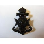 21st London Regiment (First surrey Rifles) WWI cap badge, KC (Blackened Brass, slider) Rare specimen